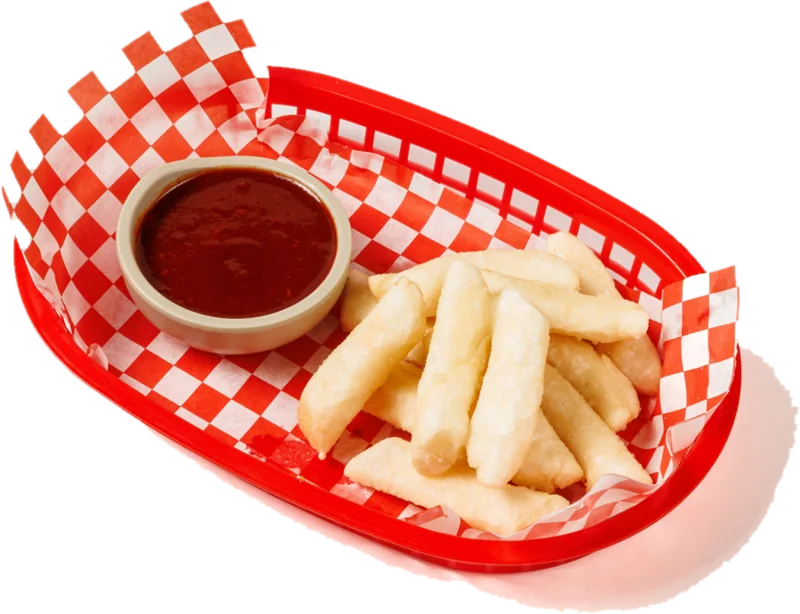 Tteok fries in a basket with Yang'Yum' sauce